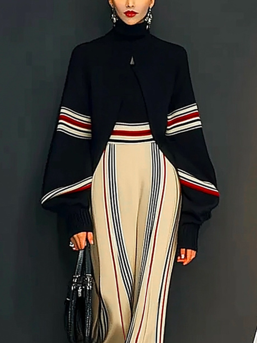 Black casual turtleneck sweater with striped raglan sleeves and heavyweight fabric.